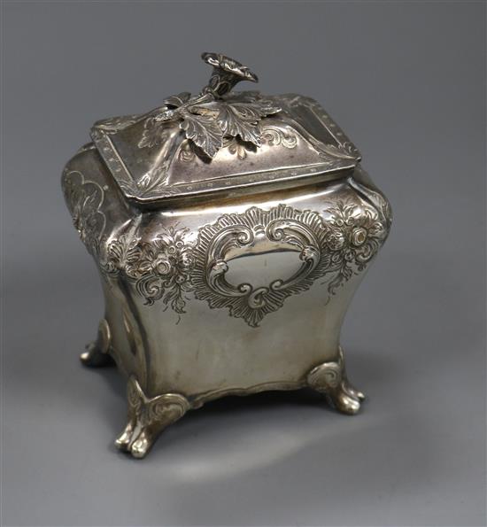 An early Victorian embossed silver bombe shaped tea caddy, Edward Barton, London, 1838, 11 oz.